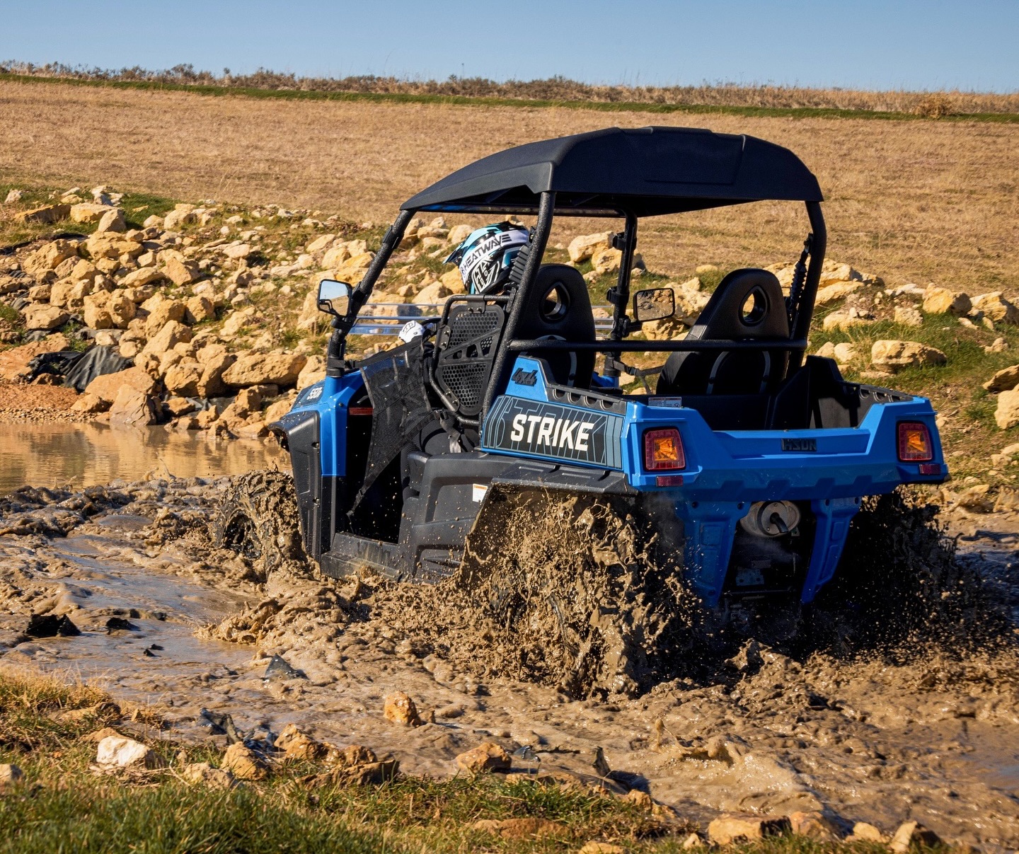 HiSun vehicle driving through muddy water